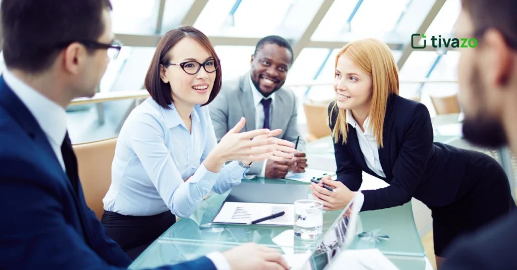 a group of people communicating with each other 