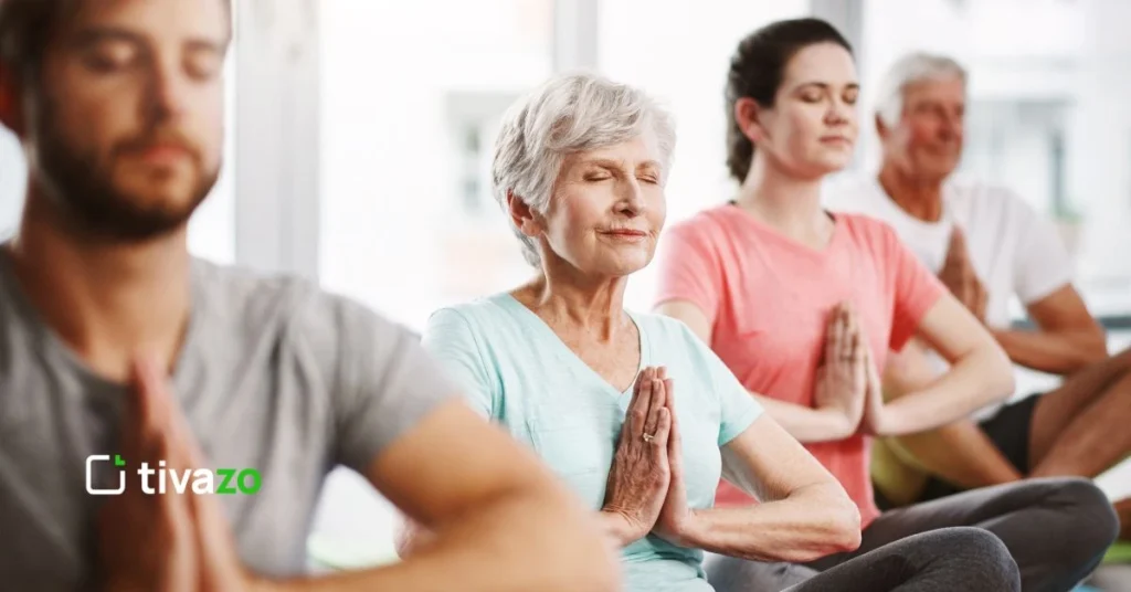 a group performing meditation practice for attention management