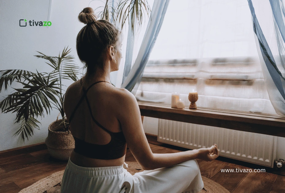 a girl doing yoga in her New York Apartment